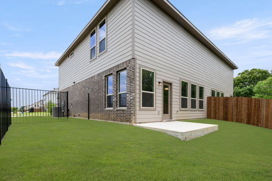 Front exterior of a new home in Eagle Cove, Denton, TX, highlighting curb appeal (Image 19). Front exterior of a new home in Eagle Cove, Denton, TX, highlighting curb appeal (Image 19).