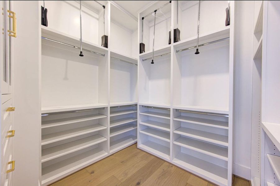 Huge closet for the King. Readily fitted with hangers for belts, ties, caps, etc.