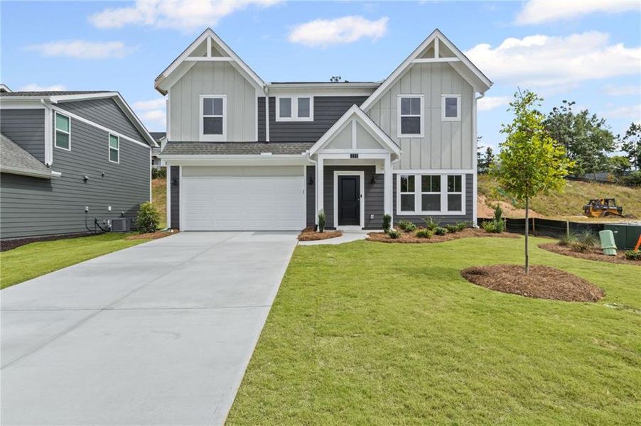 Front exterior of a new home in Sage Woods, Dallas, GA, highlighting curb appeal (Image 2).