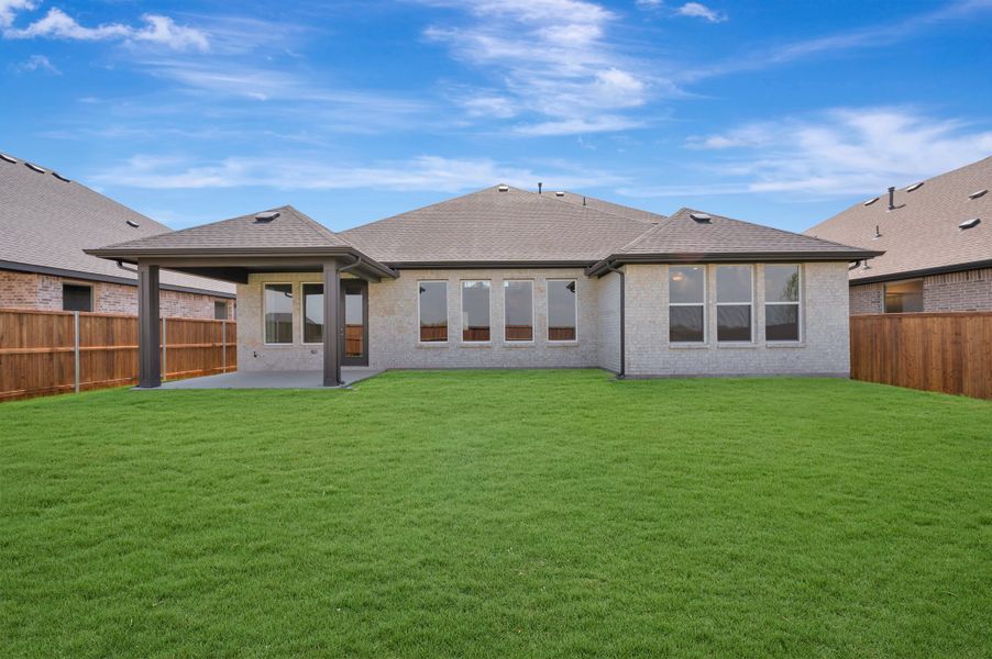 Exterior details and patio area of a home in LaPrelle, Haslet (Image 2). Exterior details and patio area of a home in LaPrelle, Haslet (Image 2).