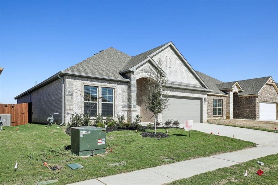 Front exterior of a new home in , Alvarado, TX, highlighting curb appeal (Image 16).
