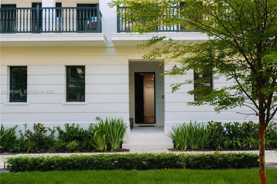 Exterior details and patio area of a home in The Village at Coral Gables, Coral Gables (Image 20). Exterior details and patio area of a home in The Village at Coral Gables, Coral Gables (Image 20).