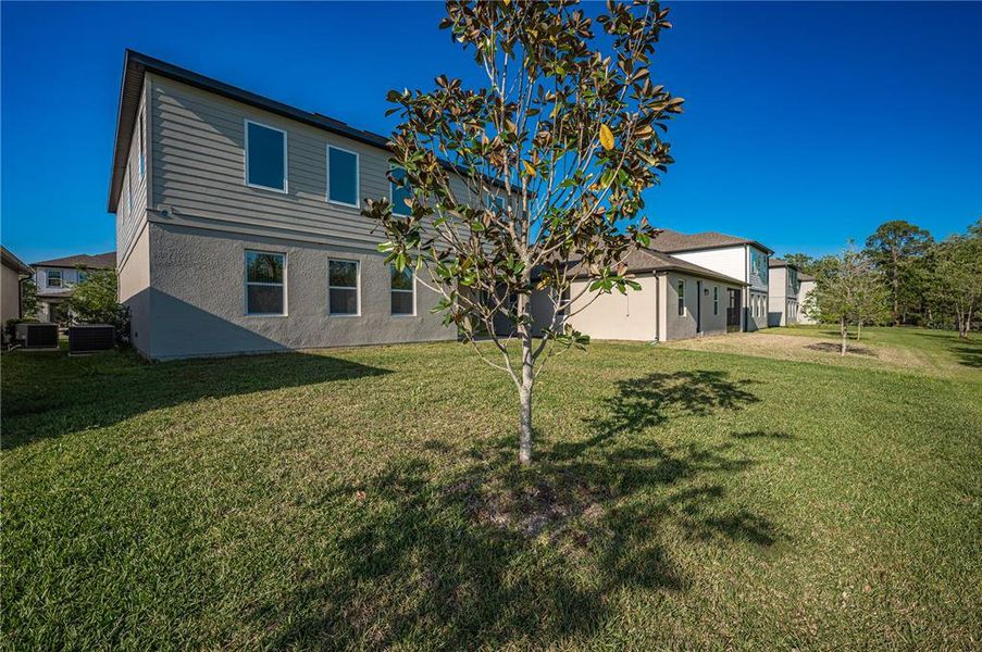 Front exterior of a new home in , Orlando, FL, highlighting curb appeal (Image 12). Front exterior of a new home in , Orlando, FL, highlighting curb appeal (Image 12).