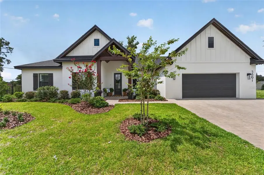 Front exterior of a new home in , Lakeland, FL, highlighting curb appeal (Image 27). Front exterior of a new home in , Lakeland, FL, highlighting curb appeal (Image 27).