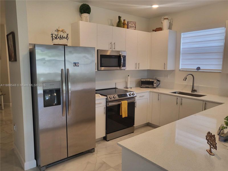 Furnished interior view inside a new home in , Homestead (Image 15).