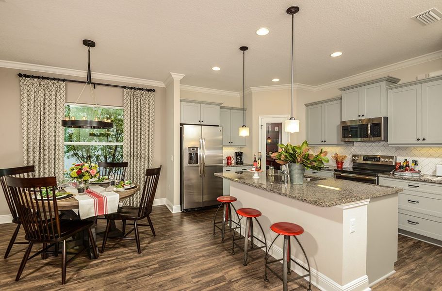 Representative furnished interior of a home built from the Fresh Spring by Neal Communities in SkySail, Naples (Image 7).