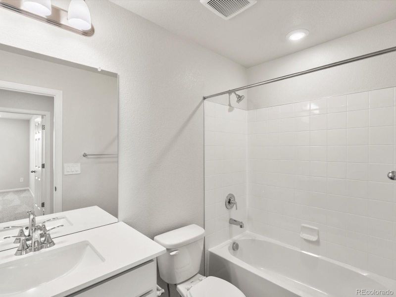 Furnished interior view inside a new home in Buffalo Highlands: The Flora Collection, Commerce City (Image 10).