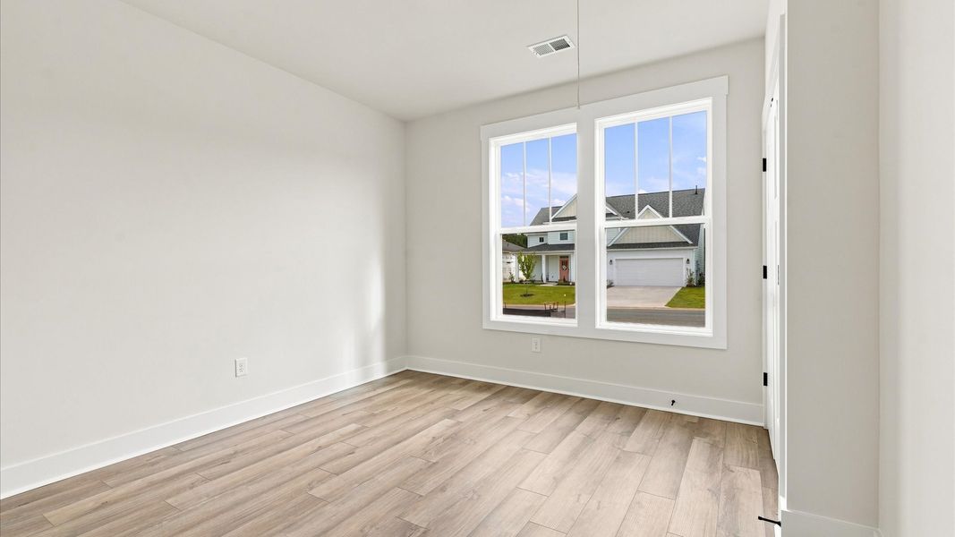 Functional secondary bedroom with hardwood flooring and modern touches in an exceptional layout near Lake Hartwell