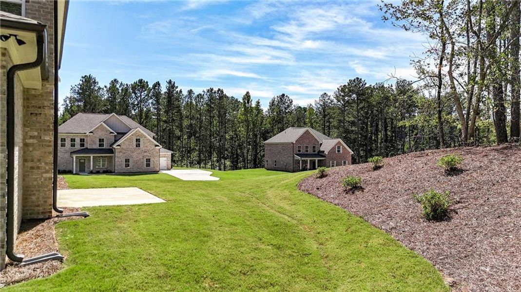 Exterior details and patio area of a home in , Ellenwood (Image 32).