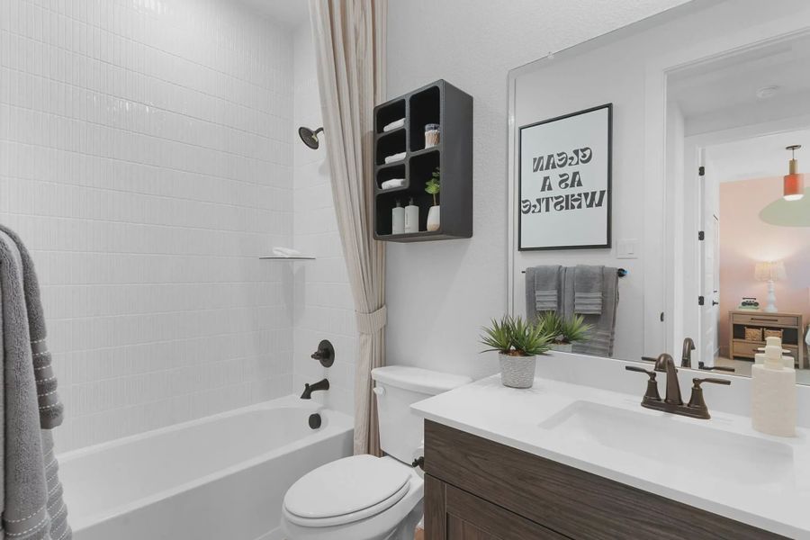 Representative furnished interior of a home built from the Branford by Chesmar Homes in Highland Village, Georgetown (Image 16).