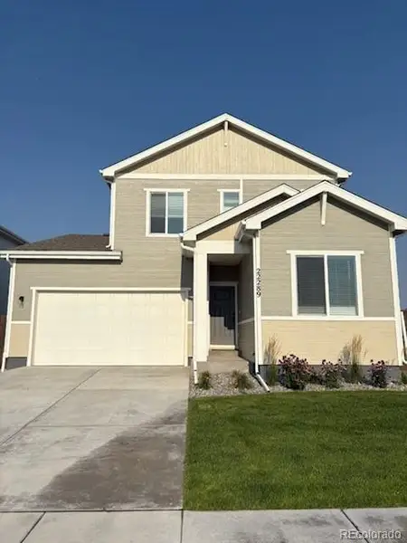 Front exterior of a new home in , Calhan, CO, highlighting curb appeal (Image 1).