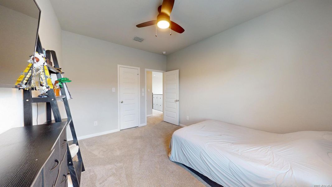 Furnished interior view inside a new home in Bison Ridge, San Antonio (Image 35).