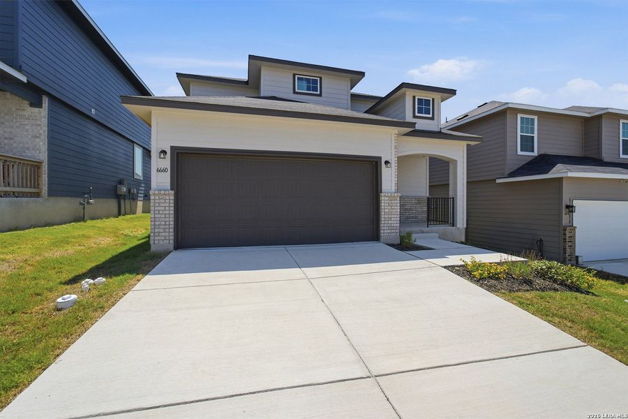 Front exterior of a new home in Willow View, Converse, TX, highlighting curb appeal (Image 19). Front exterior of a new home in Willow View, Converse, TX, highlighting curb appeal (Image 19).