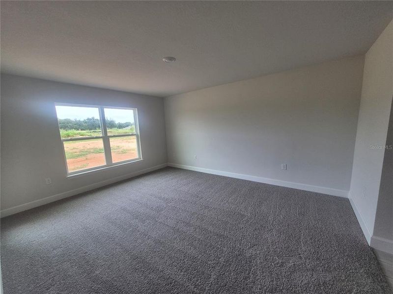 Spacious, unfurnished interior of a new home in Hill Country Estates, Dade City (Image 19).