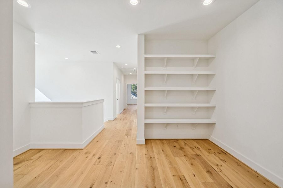 Looking back towards the hallway from the reading nook and gameroom area.