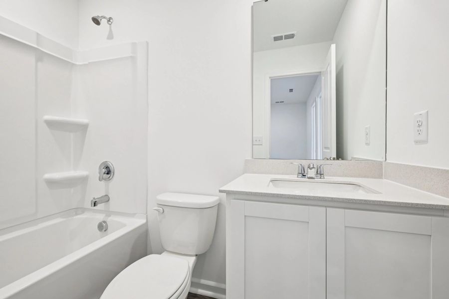 Furnished interior view inside a new home in Towns at The Point, Rolesville (Image 9).