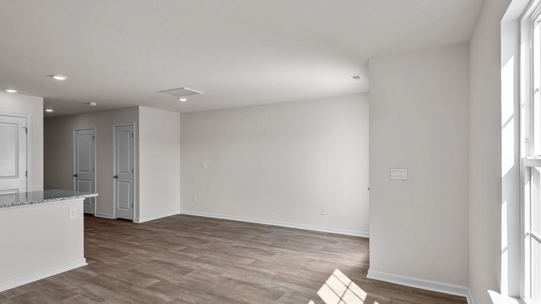 Spacious, unfurnished interior of a new home in Edinborough Townes, Gibsonville (Image 8).
