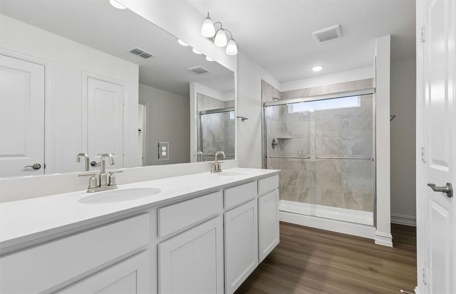 Primary bath with two vanities