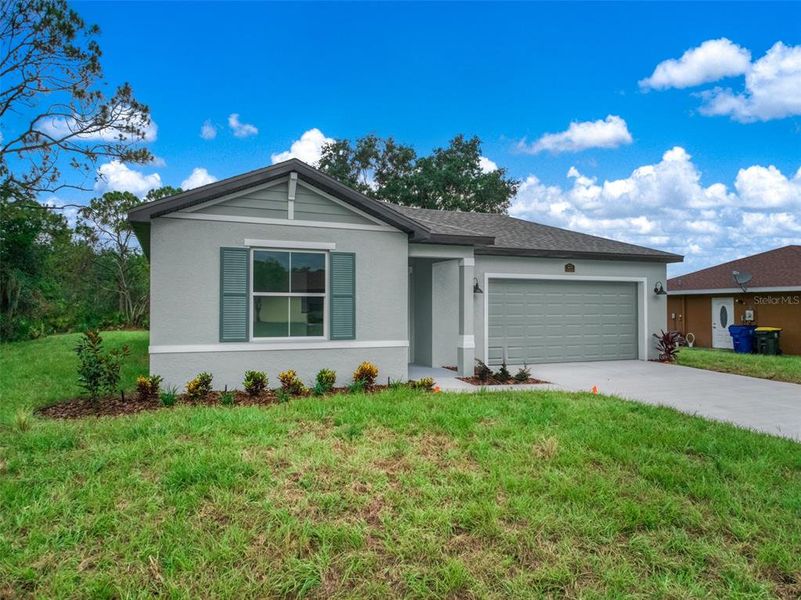 Front exterior of a new home in , Sebring, FL, highlighting curb appeal (Image 28).