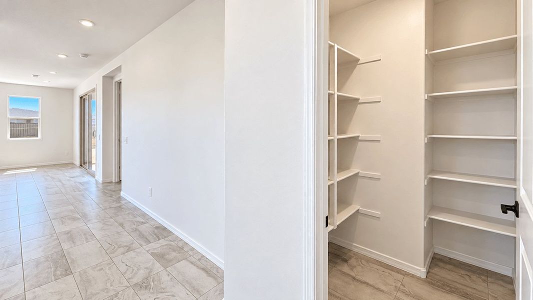 Spacious, unfurnished interior of a new home in The Ridge at Sienna Hills, Buckeye (Image 12).