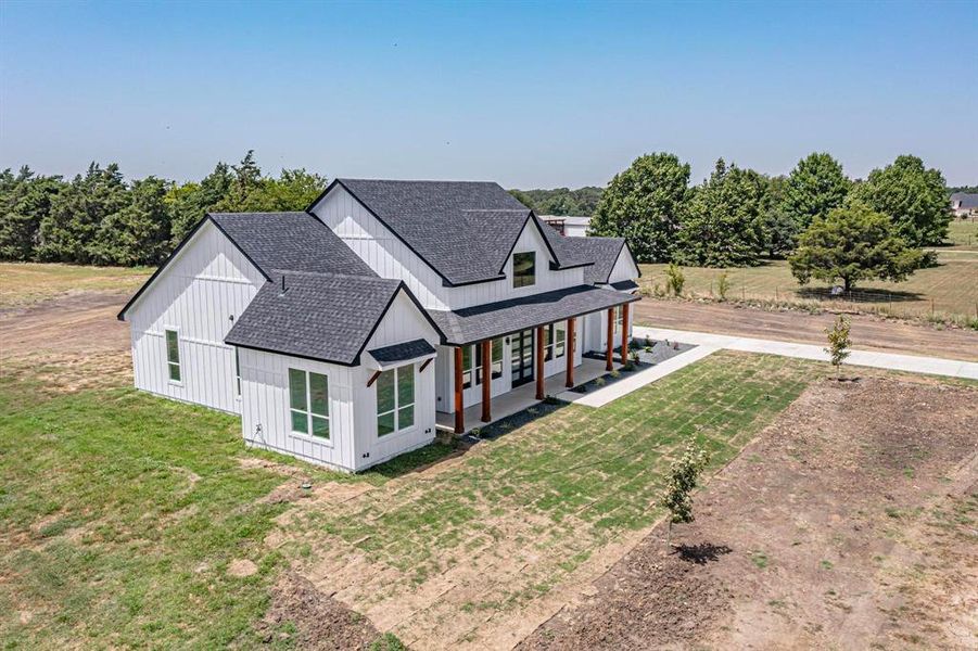 View of front of property with a front lawn