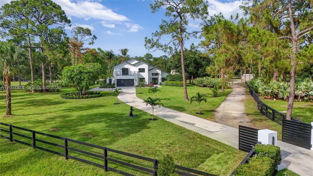 Front exterior of a new home in , Palm Beach Gardens, FL, highlighting curb appeal (Image 32).