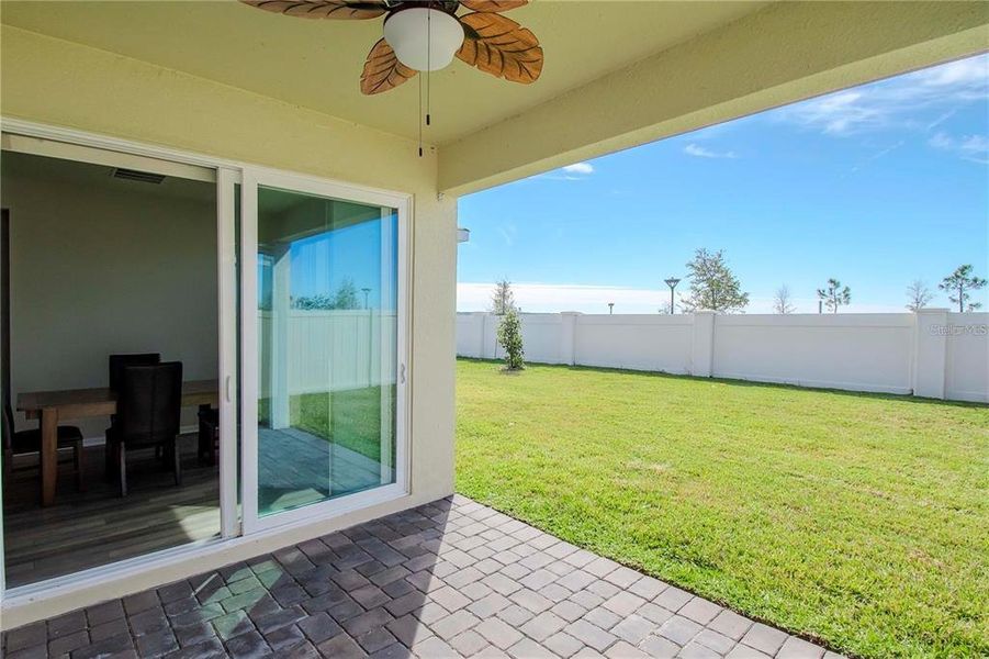 Exterior details and patio area of a home in Tohoqua Reserve, Kissimmee (Image 3).