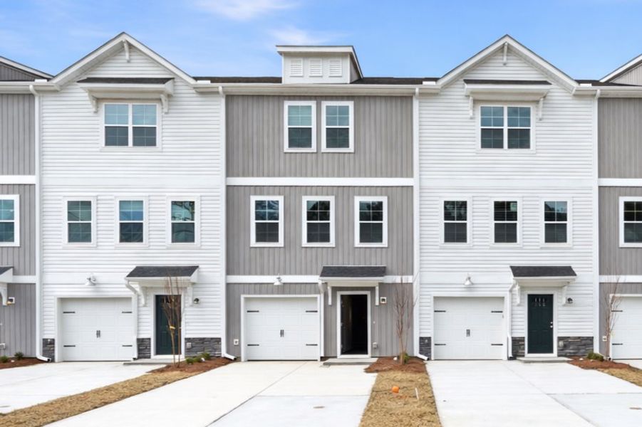 Representative exterior photo of a completed home built from the Aspen 3 Interior by McGuinn Homes in Liberty Village, Hinesville, GA (Image 24). Representative exterior photo of a completed home built from the Aspen 3 Interior by McGuinn Homes in Liberty Village, Hinesville, GA (Image 24).