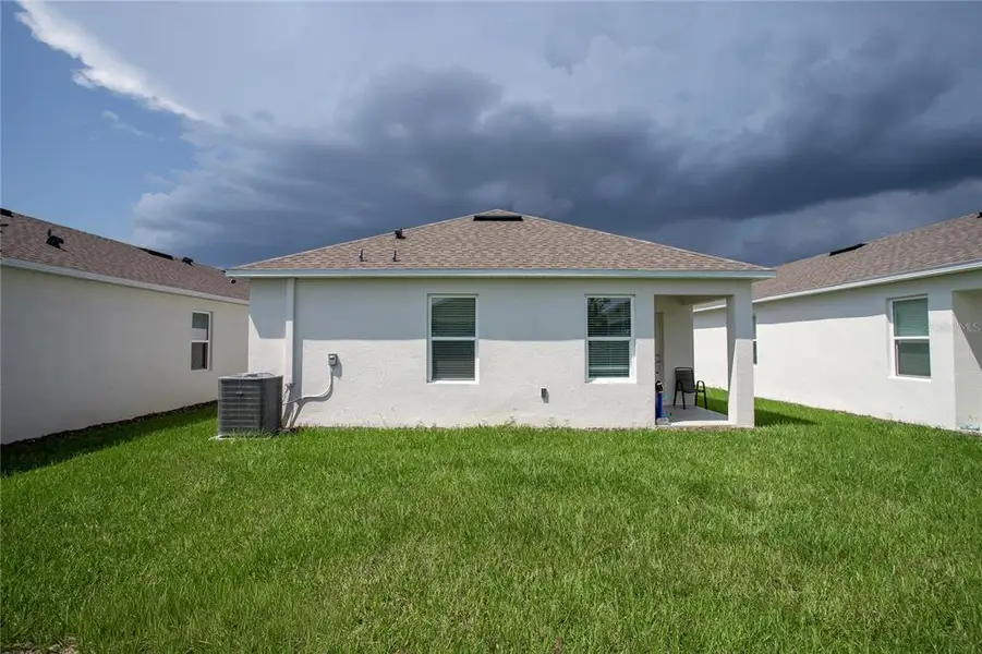Exterior details and patio area of a home in , Umatilla (Image 25).