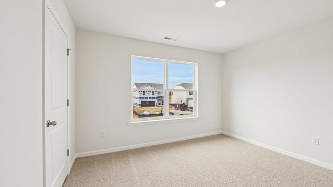 Spacious, unfurnished interior of a new home in Shahbain Reserve, Raeford (Image 20). Spacious, unfurnished interior of a new home in Shahbain Reserve, Raeford (Image 20).