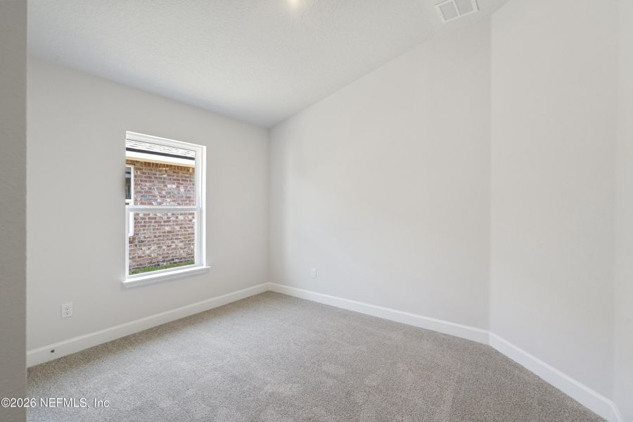 Spacious, unfurnished interior of a new home in Shadow Crest at Rolling Hills, Green Cove Springs (Image 21).