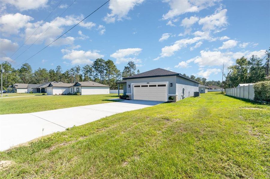 Front exterior of a new home in , Ocala, FL, highlighting curb appeal (Image 1). Front exterior of a new home in , Ocala, FL, highlighting curb appeal (Image 1).