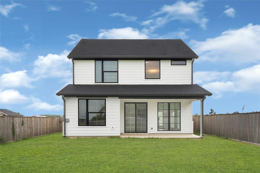 The expansive backyard features a covered patio and offers ample space for any pets, landscaping, or gardening!