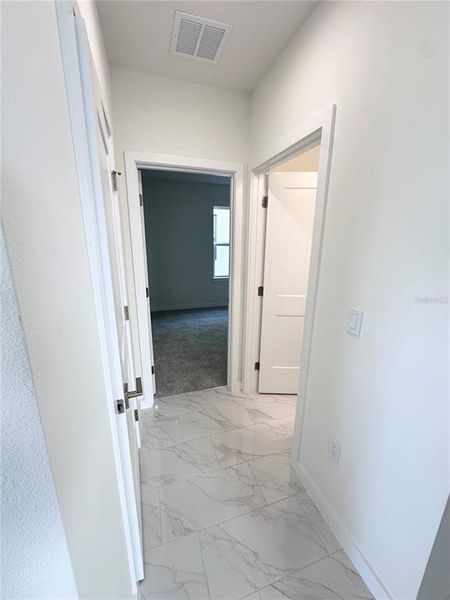 Spacious, unfurnished interior of a new home in Grasslands West, Lakeland (Image 25).