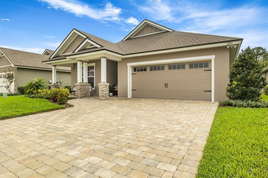 Front exterior of a new home in , Lakeland, FL, highlighting curb appeal (Image 21).