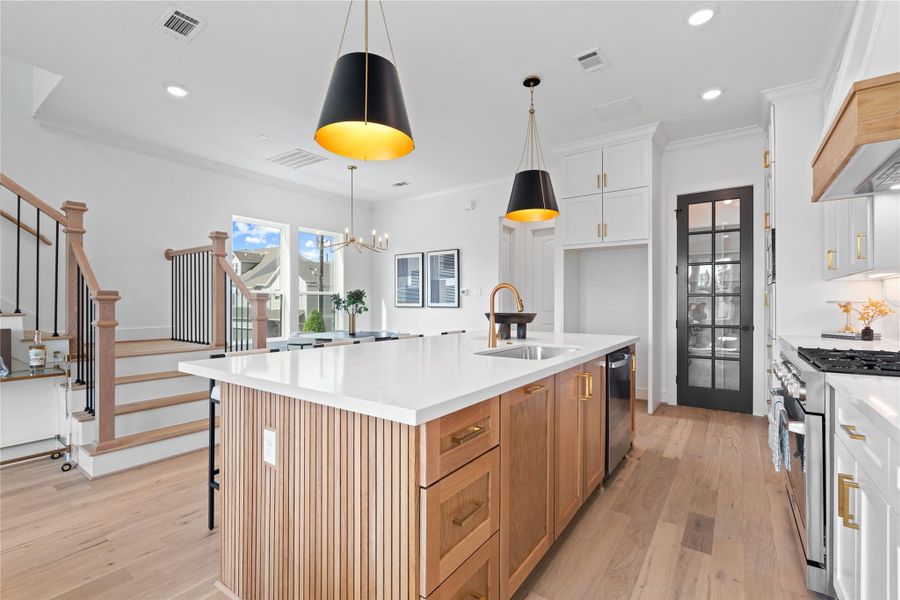 Central island with wood accents throughout.