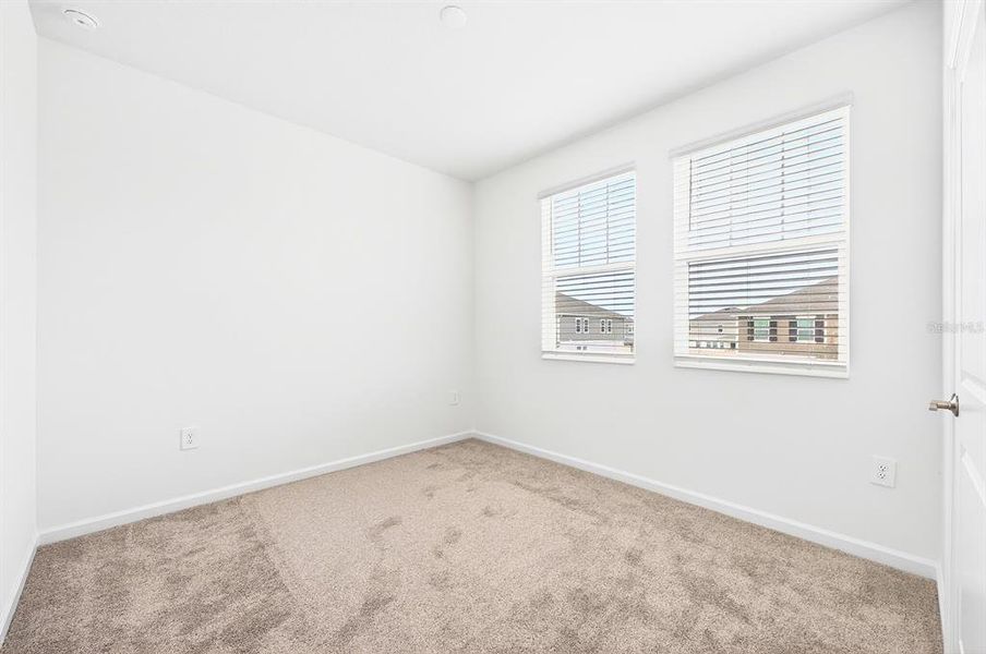 Spacious, unfurnished interior of a new home in Tohoqua, Kissimmee (Image 20).