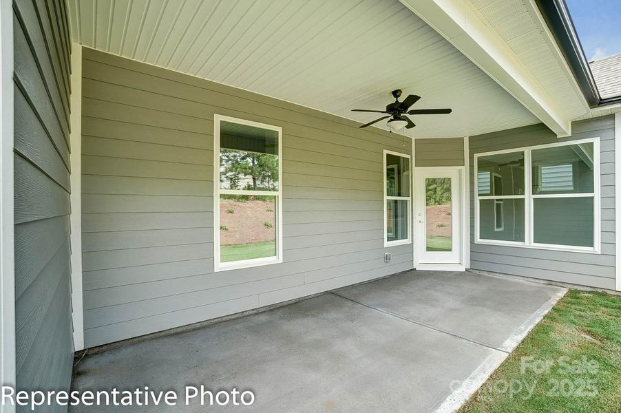 Covered porch at rear of home