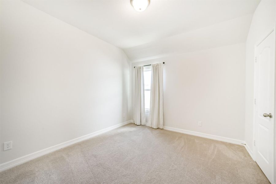Guest bedroom number two also features plush carpet, neutral paint, and a window that lets in natural light. This versatile space is ready for you to make it your own. Guest bedroom number two also features plush carpet, neutral paint, and a window that lets in natural light. This versatile space is ready for you to make it your own.