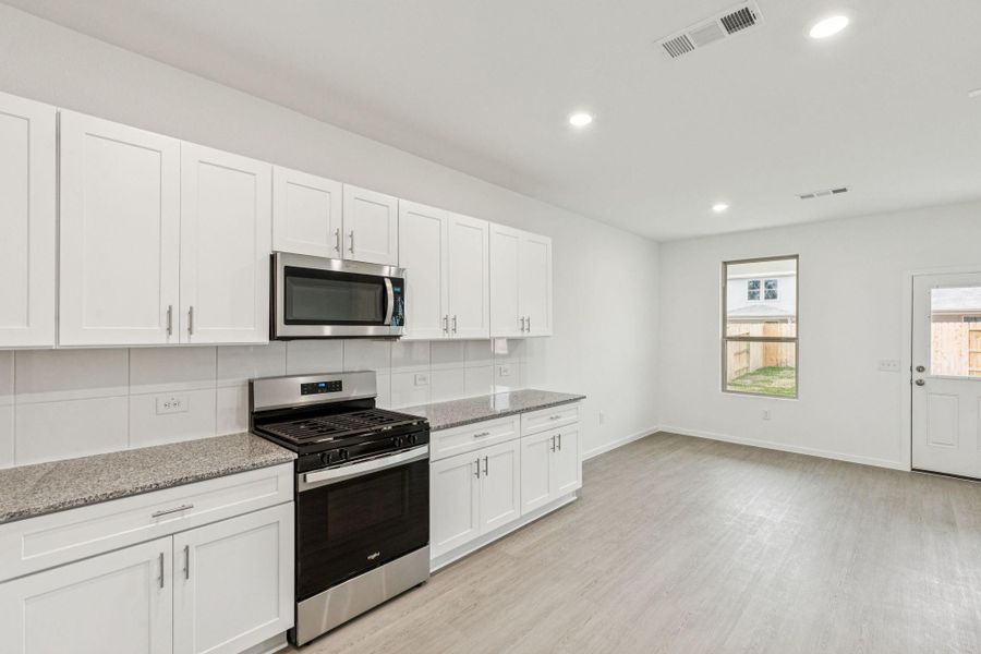 Furnished interior view inside a new home in Mavera, Conroe (Image 8).
