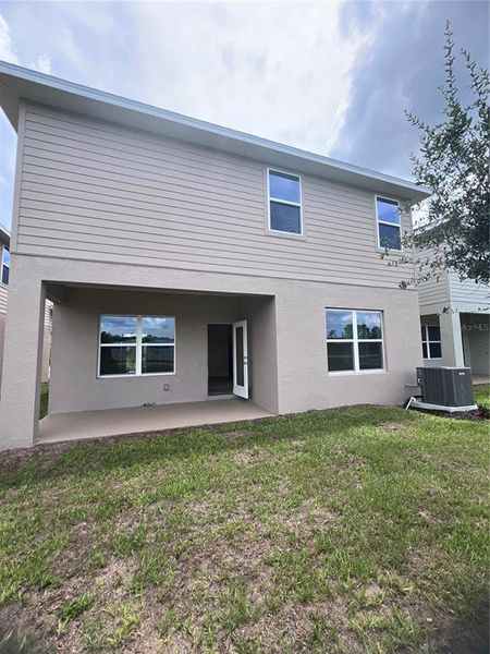 Front exterior of a new home in Harmony Central, Harmony, FL, highlighting curb appeal (Image 2). Front exterior of a new home in Harmony Central, Harmony, FL, highlighting curb appeal (Image 2).
