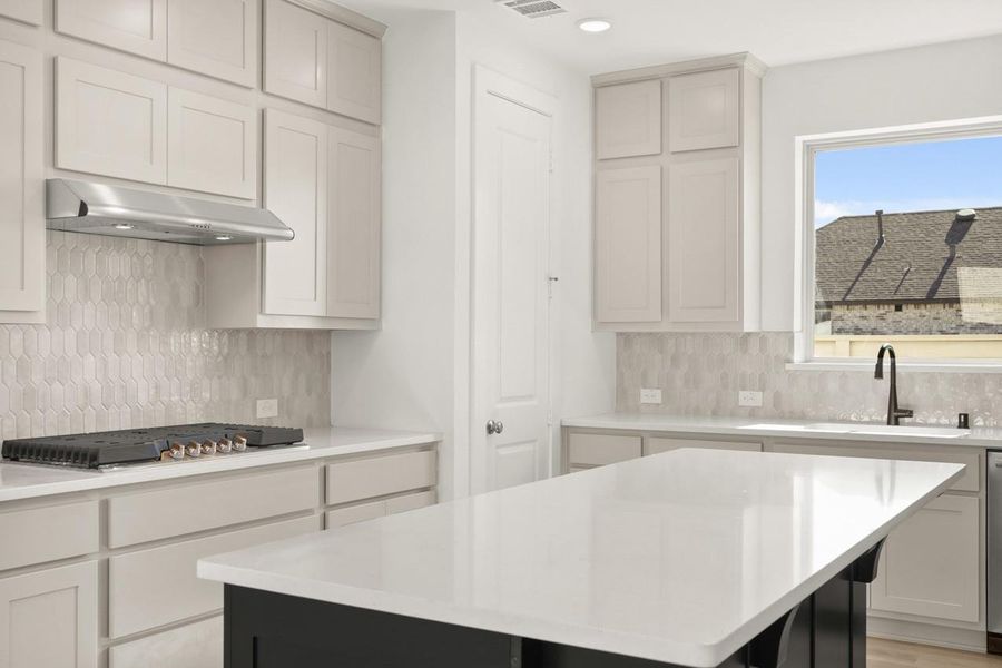 HUGE kitchen island so there's always room to cook and host!