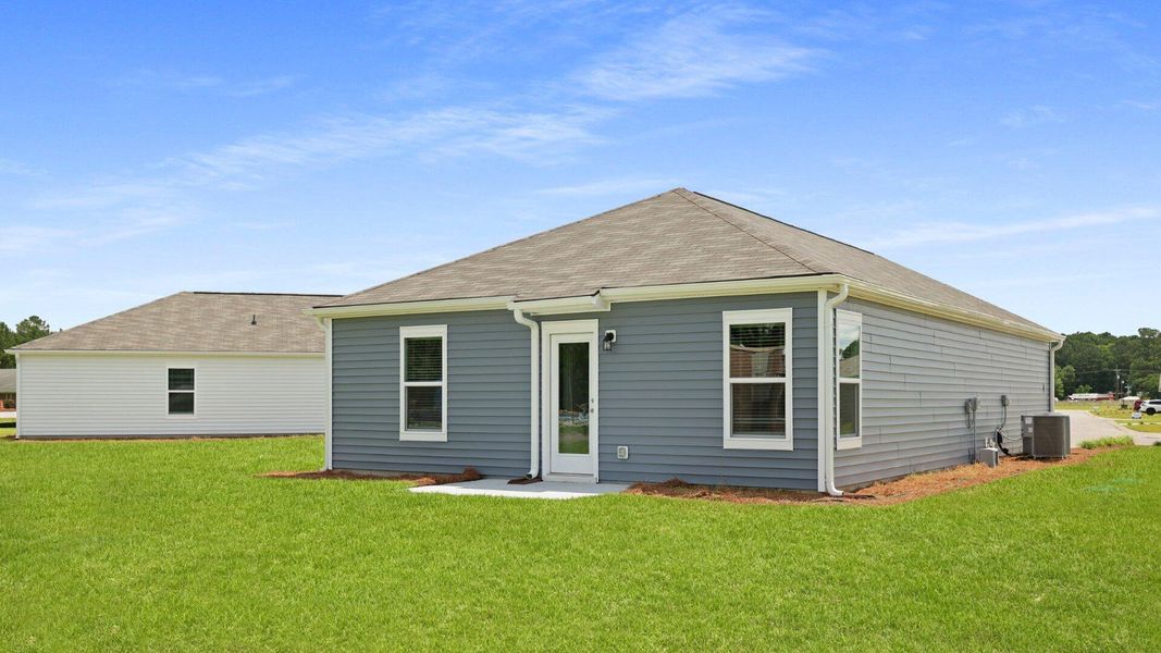 Front exterior of a new home in Evergreen, Holly Hill, SC, highlighting curb appeal (Image 25).