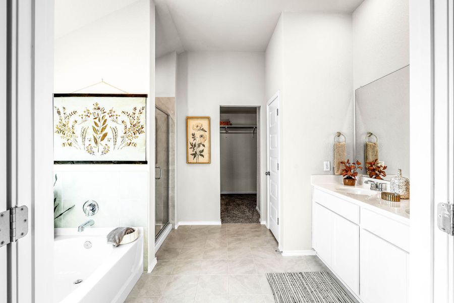 This is the primary bathroom of the Hawkins plan and is the model home in Carillon at 13305 Eppright Trace Blvd., Manor, TX. This is the primary bathroom of the Hawkins plan and is the model home in Carillon at 13305 Eppright Trace Blvd., Manor, TX.