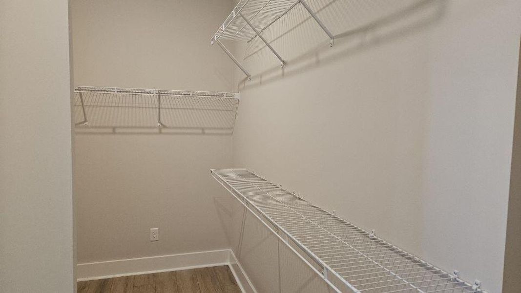 Spacious, unfurnished interior of a new home in The Enclave at French Quarter Creek, Huger (Image 15).