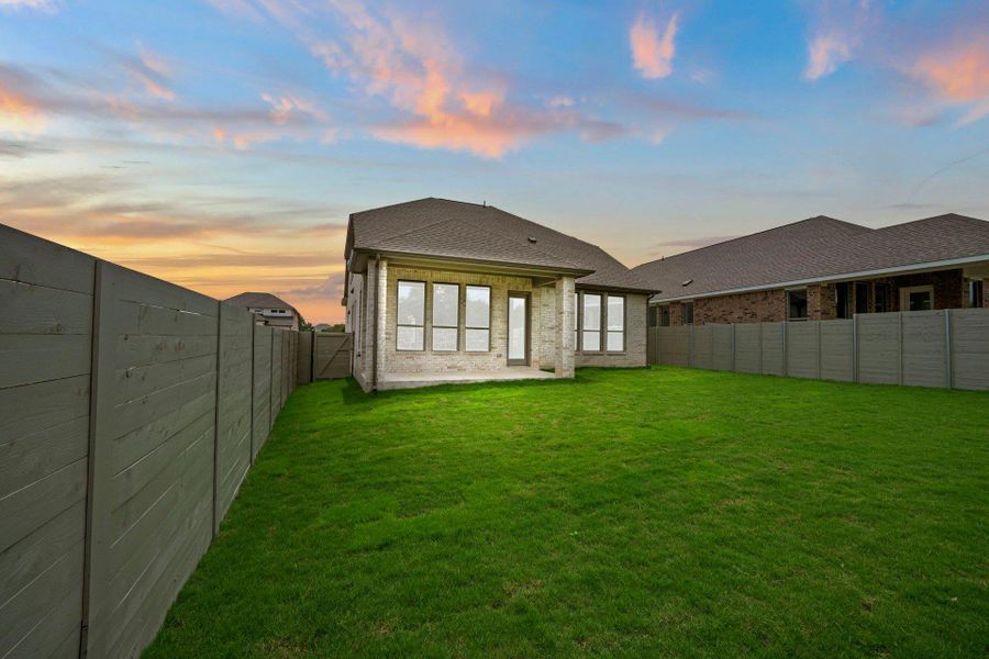 Rear of Home and Private Backyard
