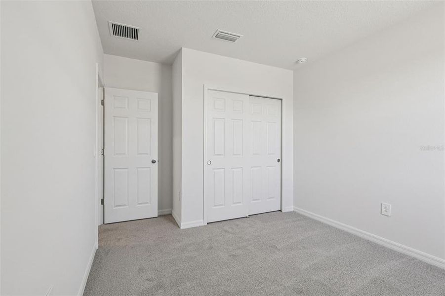 Spacious, unfurnished interior of a new home in Bradbury Creek - Signature Series, Haines City (Image 25).