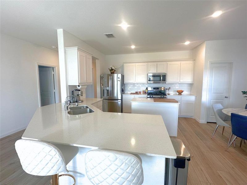 Furnished interior view inside a new home in Heartland: Classic Collection, Crandall (Image 3). Furnished interior view inside a new home in Heartland: Classic Collection, Crandall (Image 3).