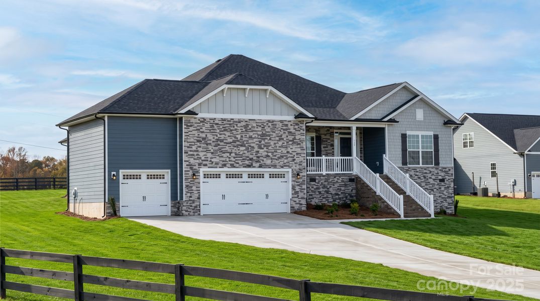 Front exterior of a new home in Swann Hills, Statesville, NC, highlighting curb appeal (Image 2). Front exterior of a new home in Swann Hills, Statesville, NC, highlighting curb appeal (Image 2).