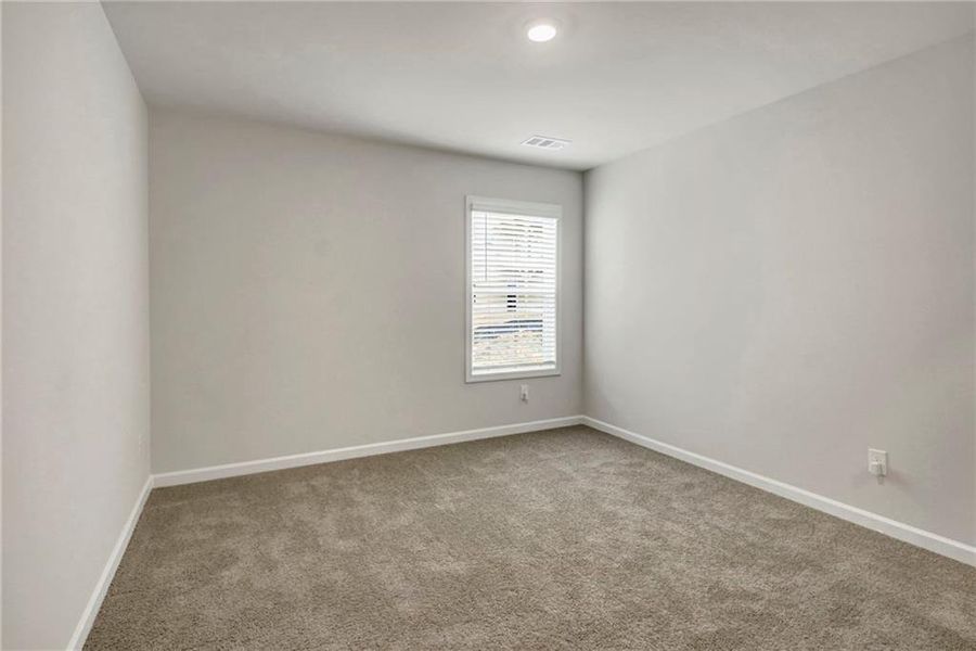 Spacious, unfurnished interior of a new home in Butner Estates, College Park (Image 27).
